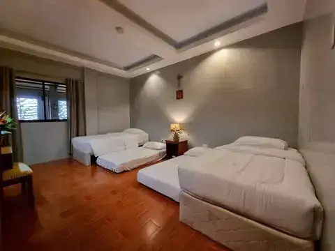 Family Room with twin pull-out beds and warm, restful interiors